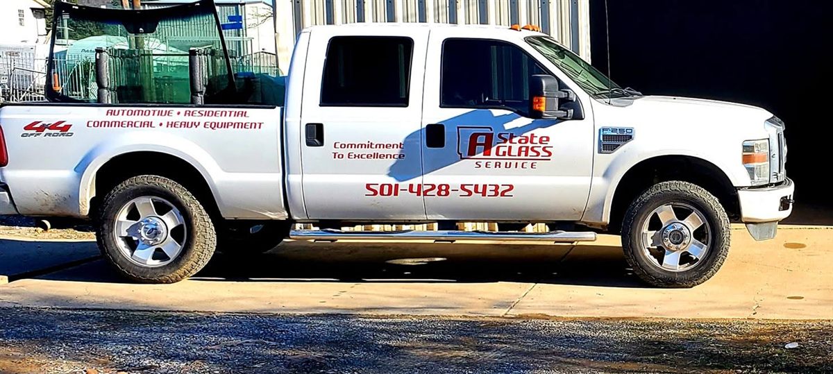 A State Glass Service work truck, fully branded with phone number 501-428-5432